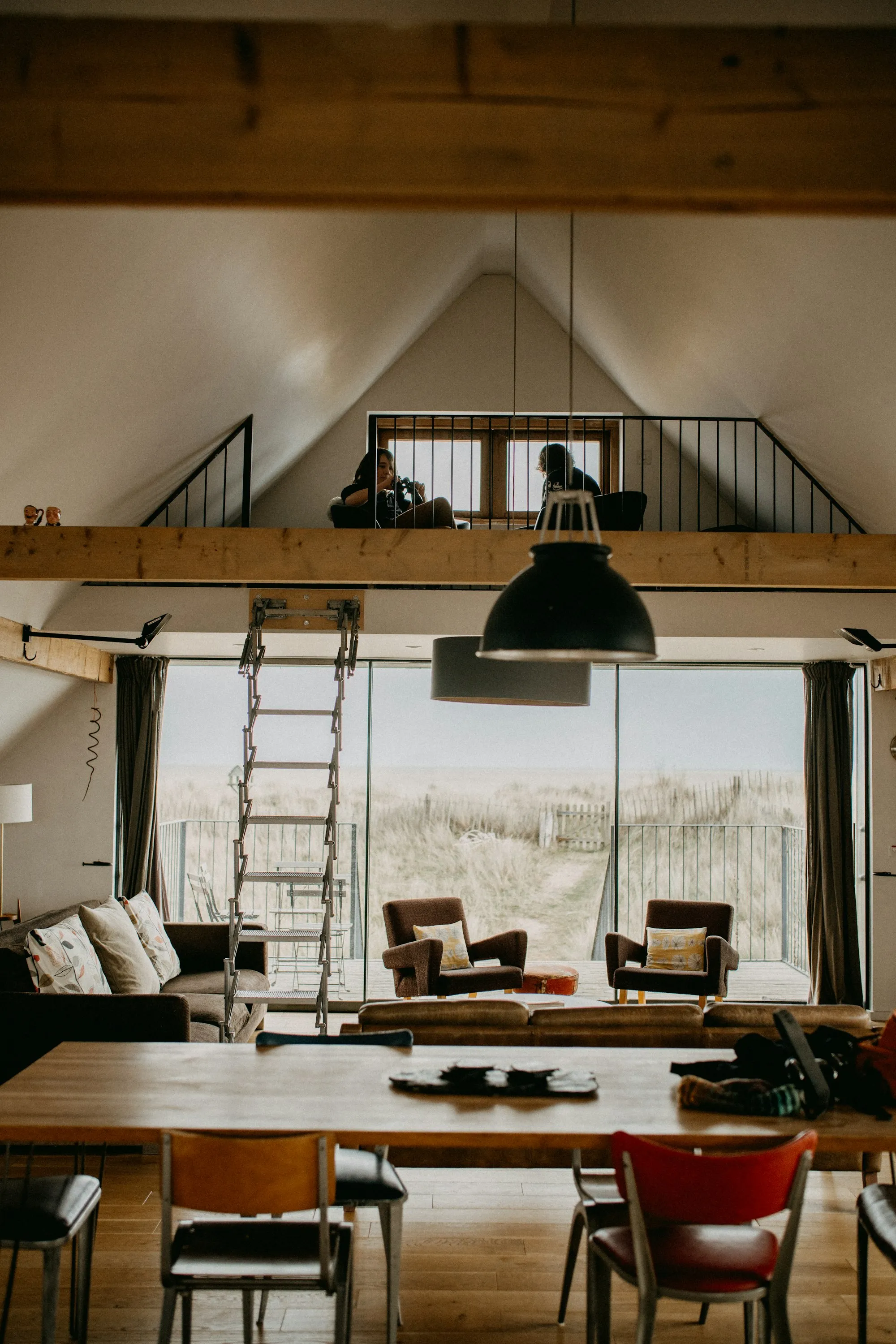 A cozy reading nook beside a sunlit window